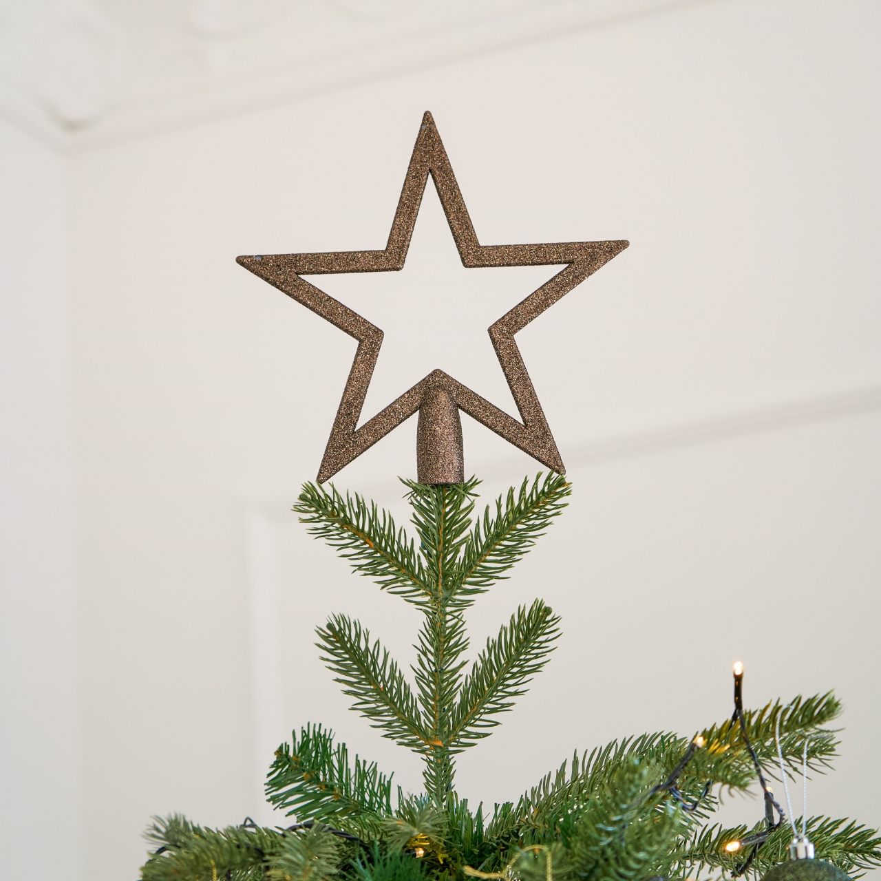 Baumspitze mit Glitzer